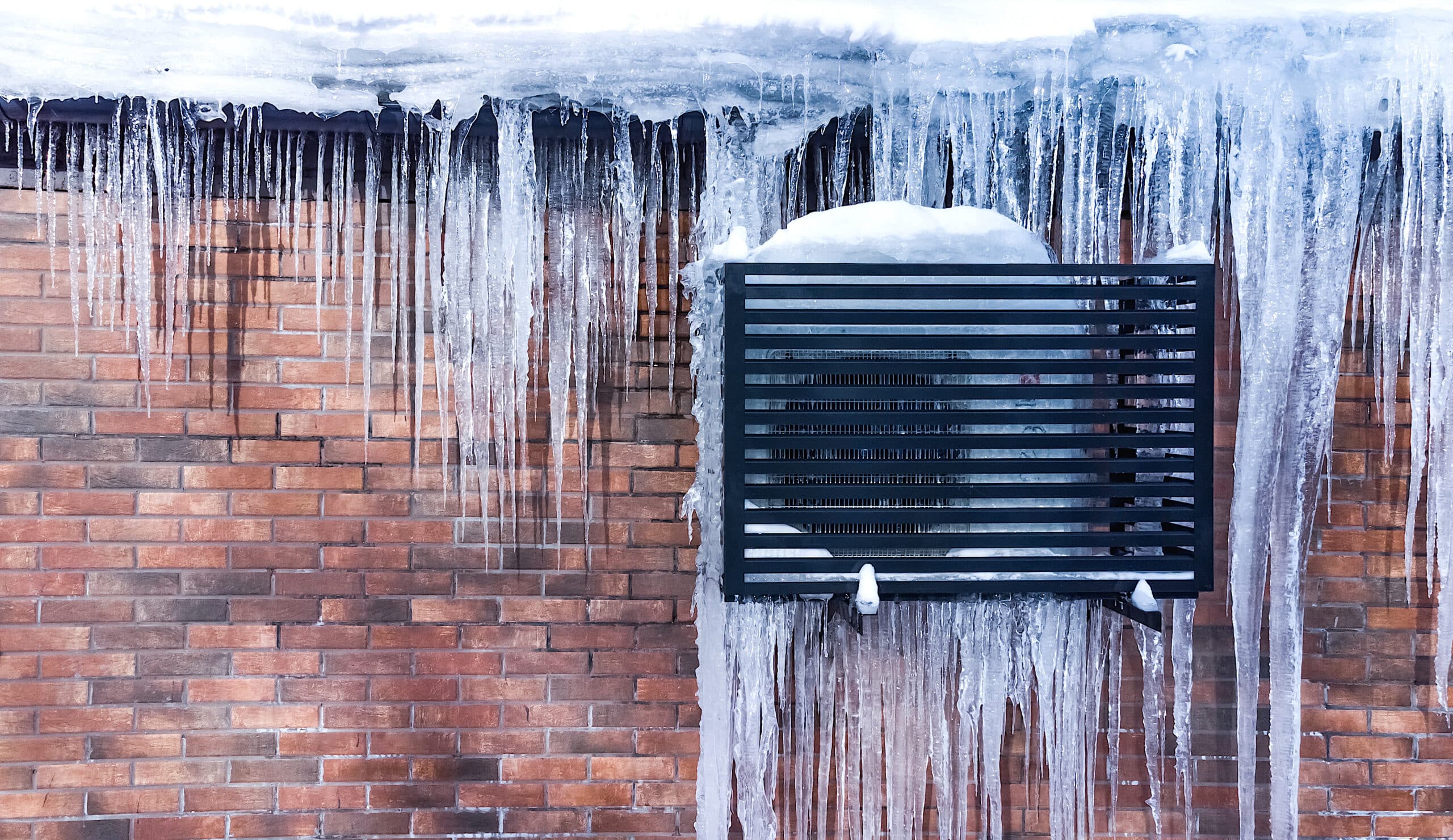 heat pump being exposed to the elements during a cold winter blast