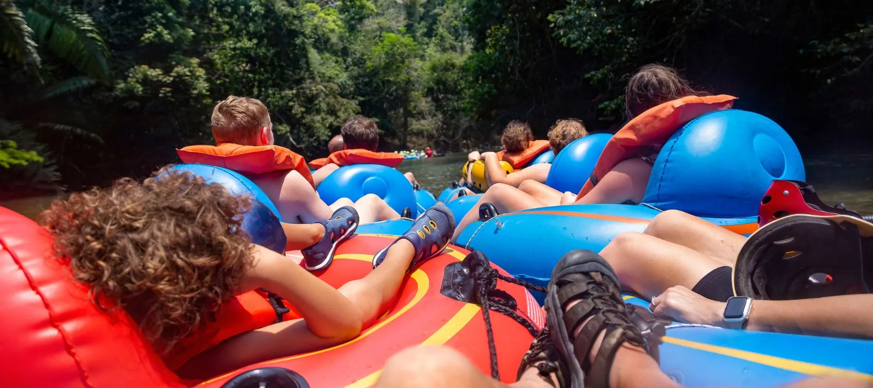 people floating in tubes on the guadalupe river