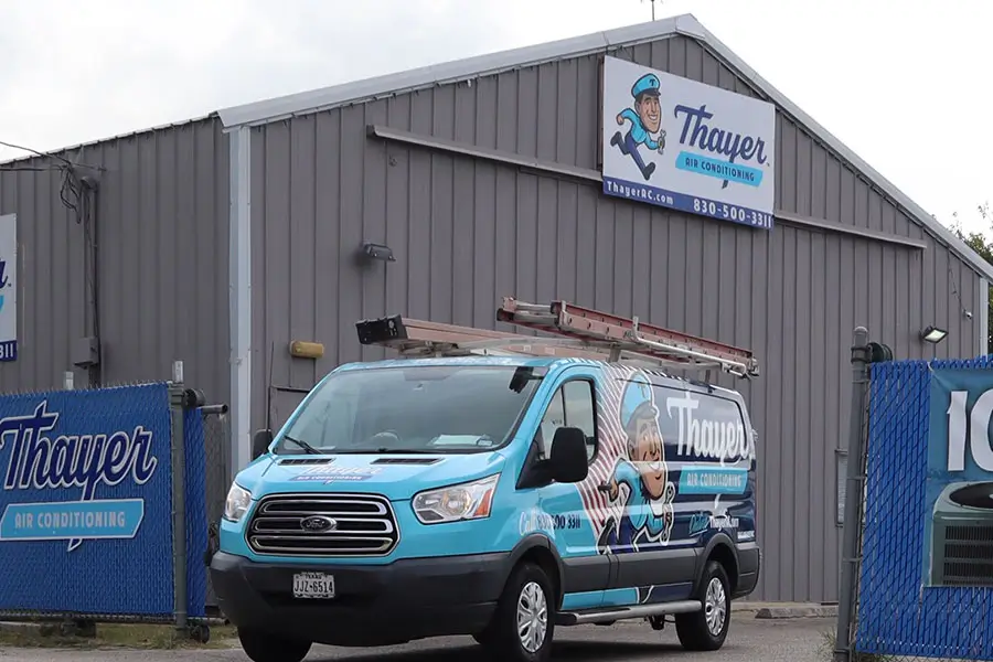 Thayer service truck arriving for an AC replacement in New Braunfels, TX